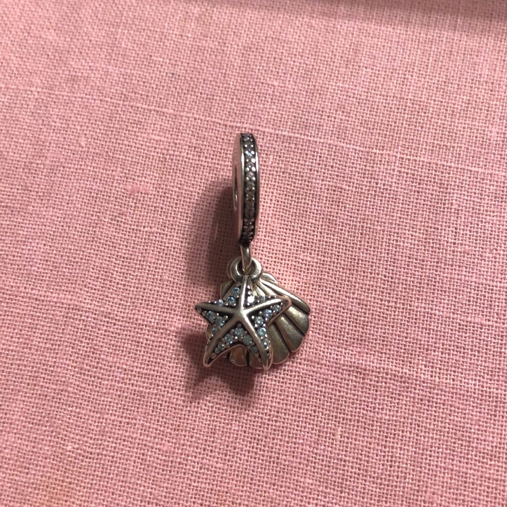 Andorra sea shell charm